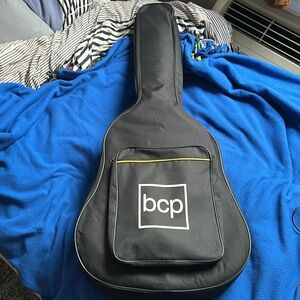 3 month used full sized BCP acoustic guitar with perfect strings picks and capo